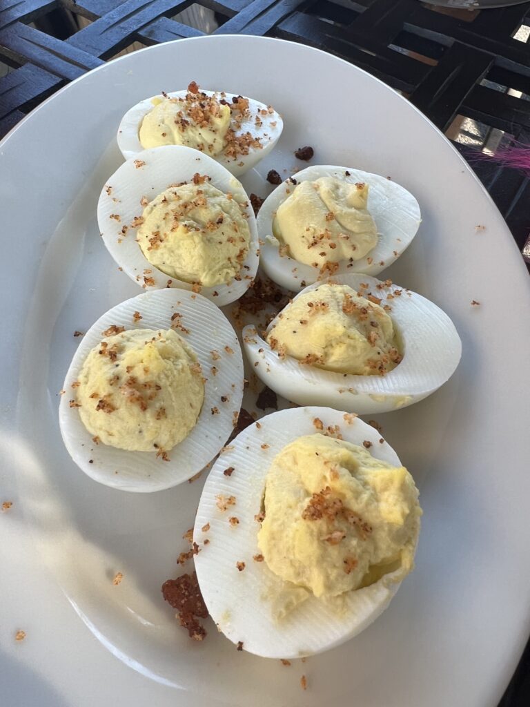 plate of deviled eggs at j renders